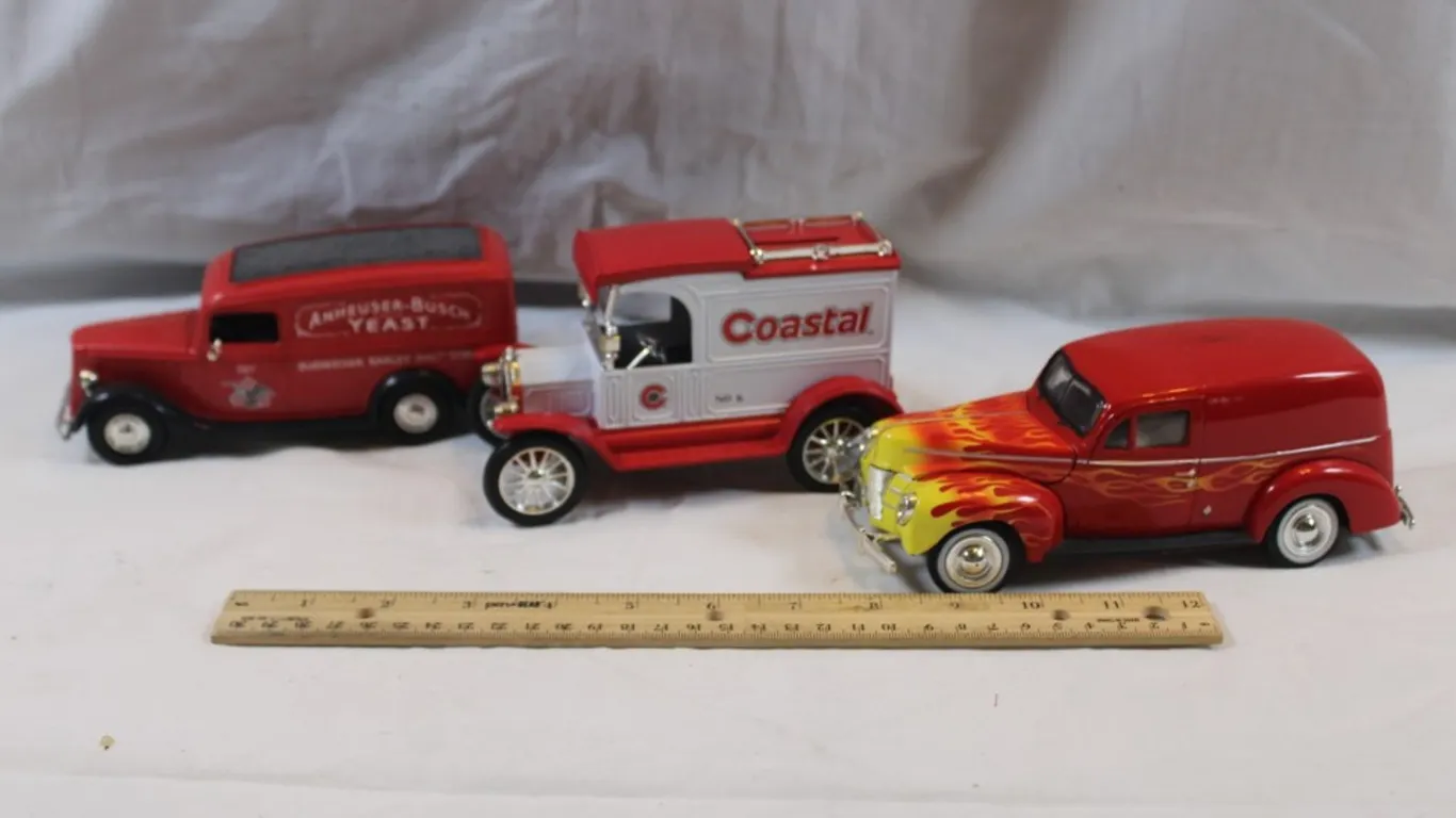 Three Diecast Cars: Anheuser Busch, Coastal, and a Flaming Hot Rod