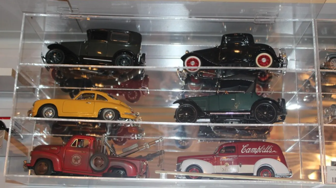 Plexiglass Display Cabinet with 6 1:18 Scale Diecast Models Including Matchbox 1944 Sedan Delivery Campbell Soup Edition 1953 Chevy Pickup Texaco Tow