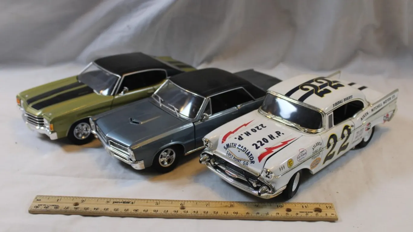 Three 1:18 Scale Diecast Models: '65 Pontiac GTO, '57 Chevy Racer, and '72 Chevy Chevelle