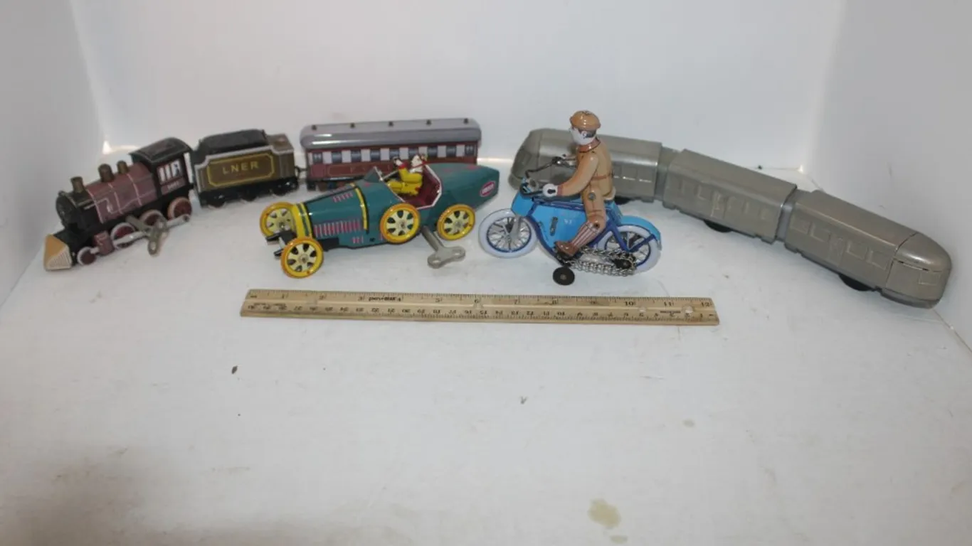 Wind up Toys: Roadster, Motorcycle, Amtrack Train, and Train (All Made in China)