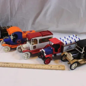 Five 1:24 Scale Diecast Advertising Cars: Tractor Supply 1918 Runabout, Union 76 1912 Delivery Car Christmas Delivery Bank, Ertl 1913 Model T Van Mobi