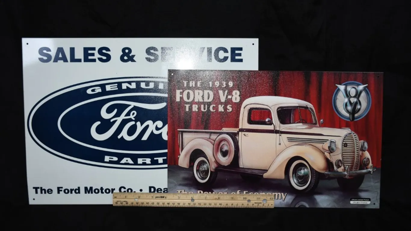 Two Tin Ford Signs
