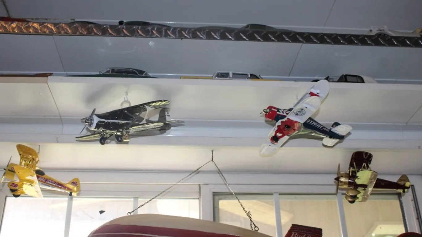 Four Die Cast Airplane Models for Mac Tools, Texaco, Bud Light, and Farm Safety Just Kids