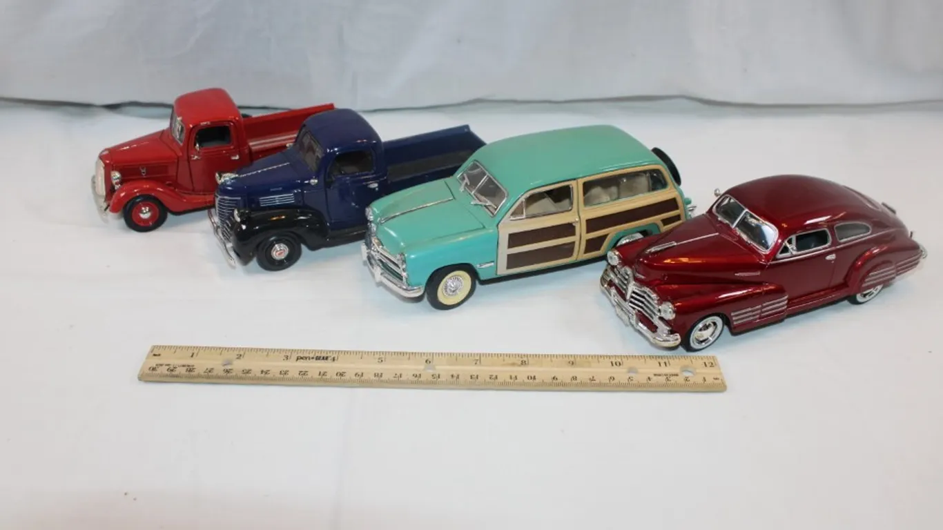 Four 1:24 Scale Cars: 1949 Ford Woody, 1941 Plymouth Truck, 1937 Ford Pickup, and 1948 Chevy Aerocoupe