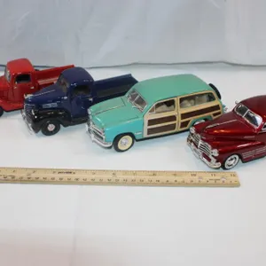 Four 1:24 Scale Cars: 1949 Ford Woody, 1941 Plymouth Truck, 1937 Ford Pickup, and 1948 Chevy Aerocoupe
