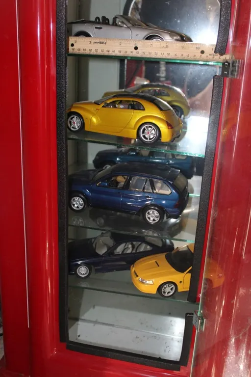 Five 1:18 Scale Cars: Maisto 1996 Mercedes-Benz SLK 230, Maisto Chrysler Pronto Cruiser, BMW X5, Maisto BMW 850i, and Maisto 1999 Mustang GT