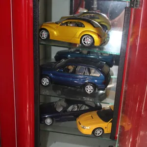 Five 1:18 Scale Cars: Maisto 1996 Mercedes-Benz SLK 230, Maisto Chrysler Pronto Cruiser, BMW X5, Maisto BMW 850i, and Maisto 1999 Mustang GT