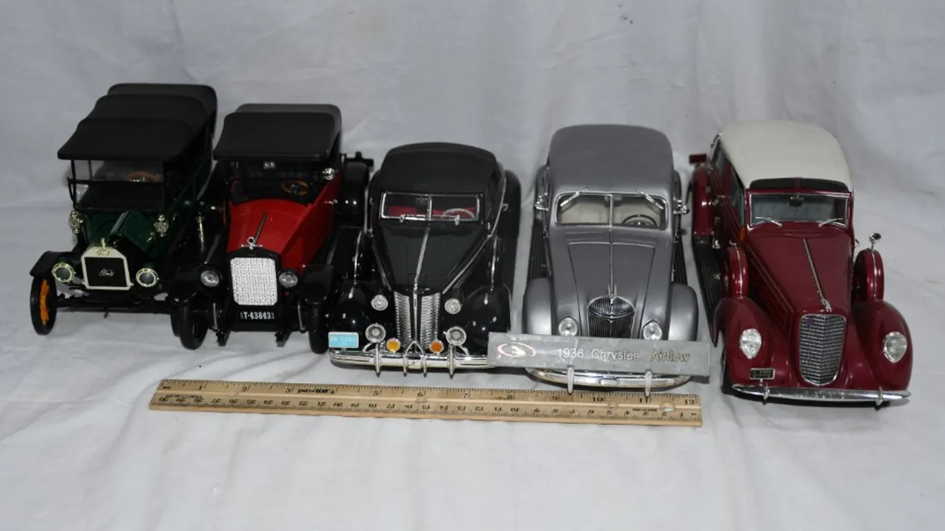 Five 1/18 Scale Die Cast Cars: 1936 Chrysler Airflow, 1937 Lincoln Touring Cabriolet, 1938 Buick,