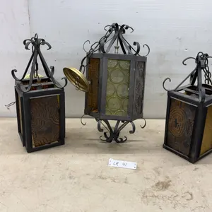 Three Wrought Iron and Stained Glass Hanging Lanterns, One with Brass Cap