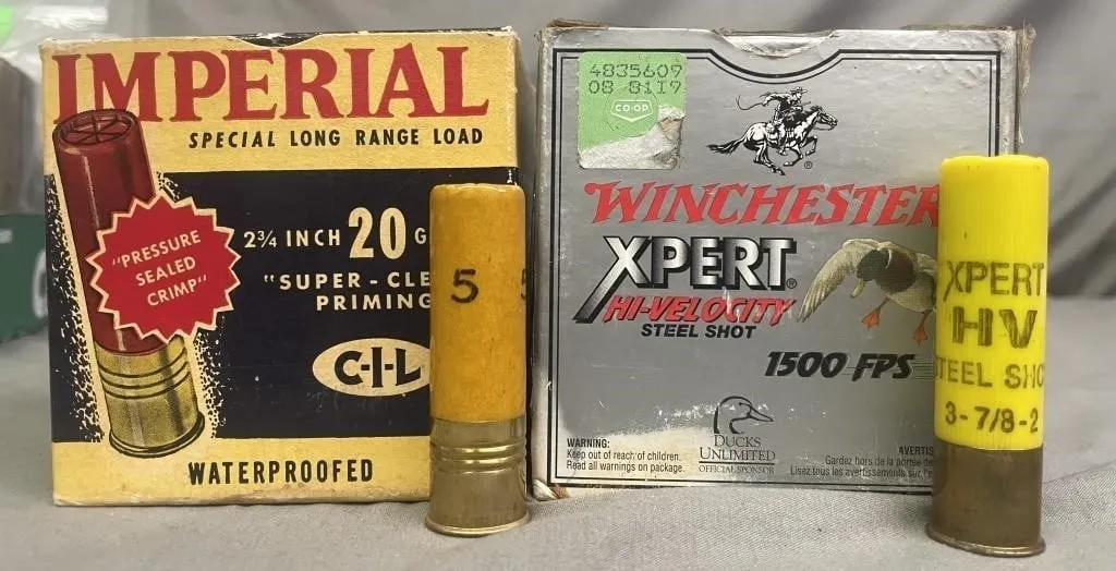 Two open boxes of 20 ga. shotgun shells. Vintage