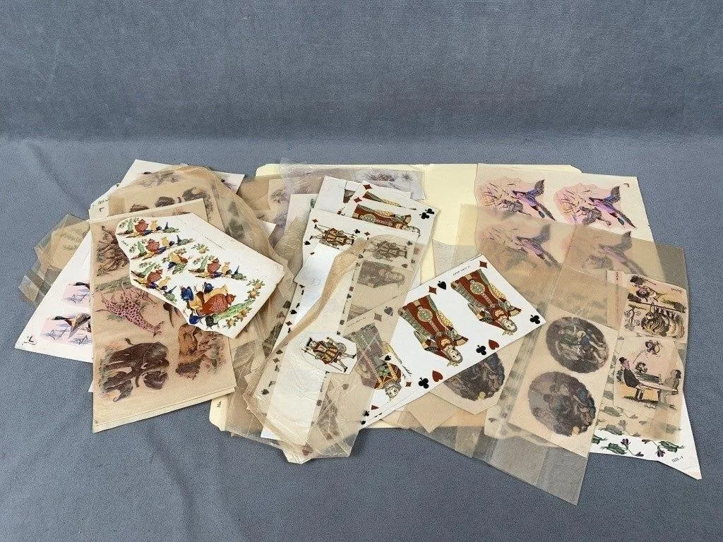 Box of Scrap Booking Paper Sheets