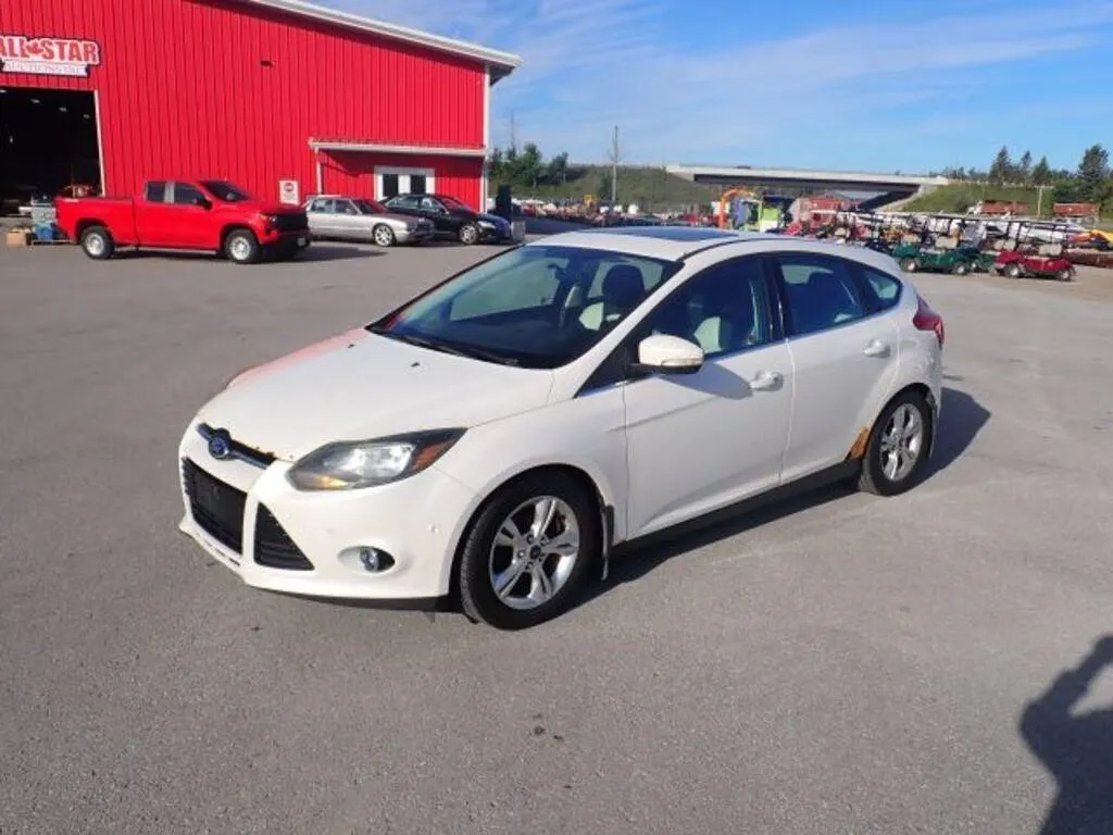 2014 Ford Focus Titanium Automobile 1FADP3N23EL214