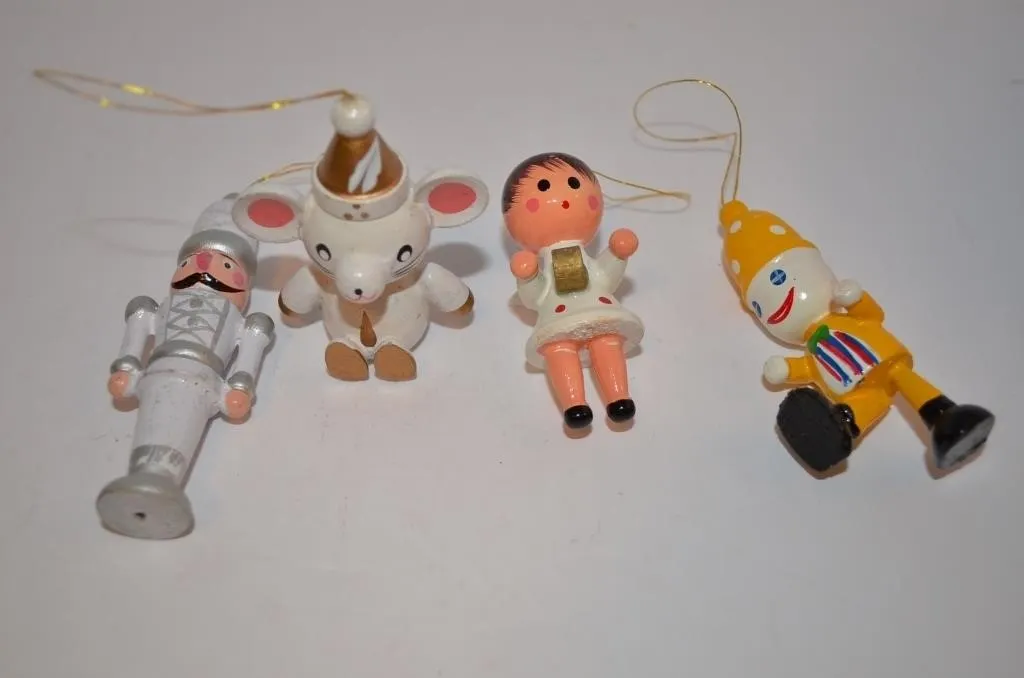 Four vintage hand-painted miniature wooden