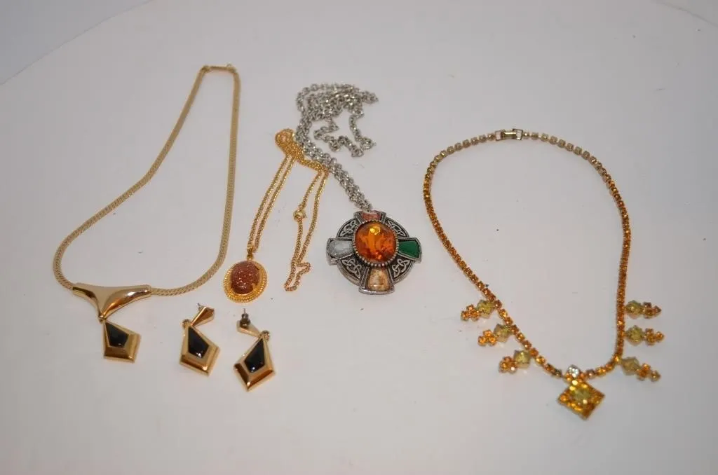 Vintage costume jewelry collection containing