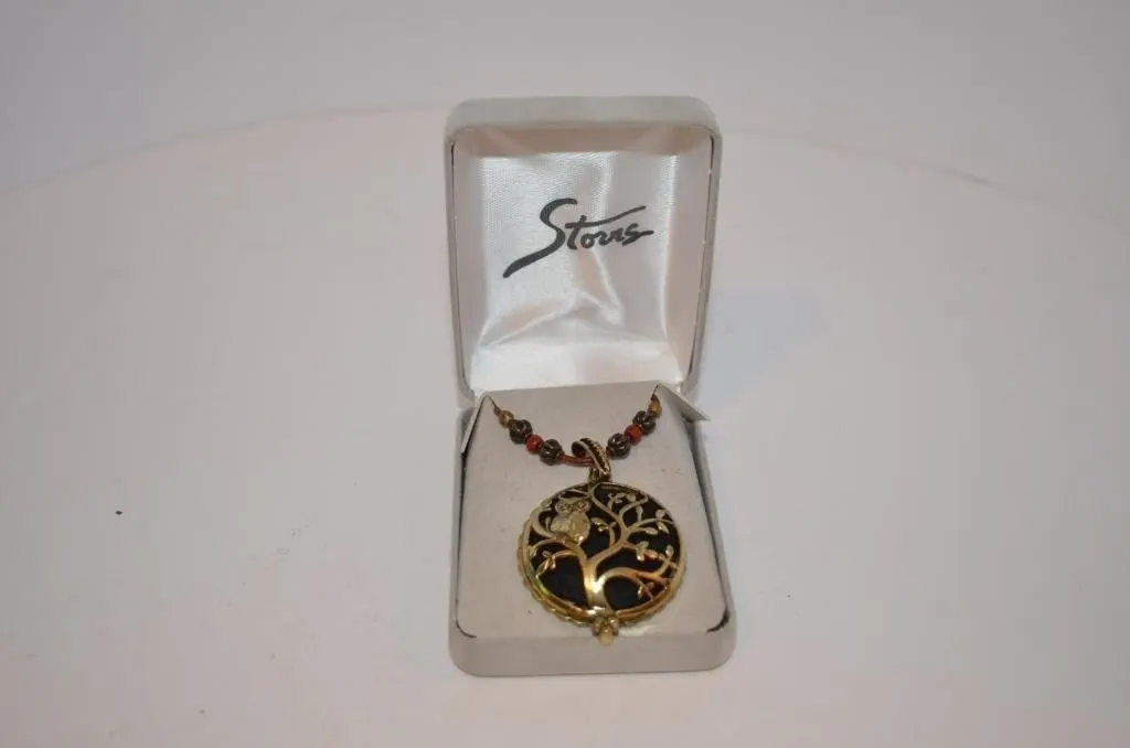 Gold-toned Tree of Life and owl locket pendant