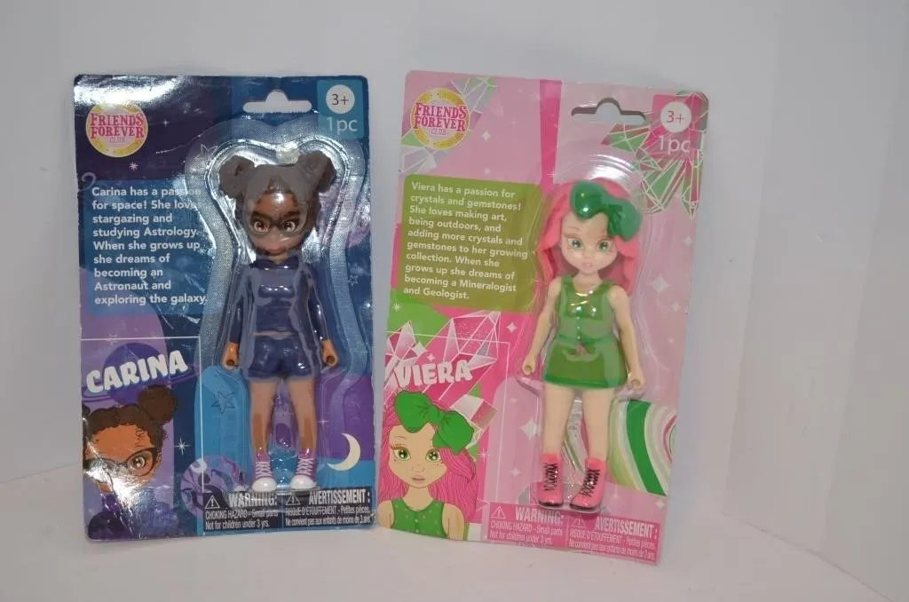 Two 5-inch collectible fashion dolls from the