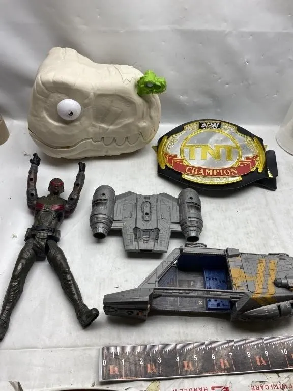 Toy Lot: Action Figure, Belt, Ships & Dino Head