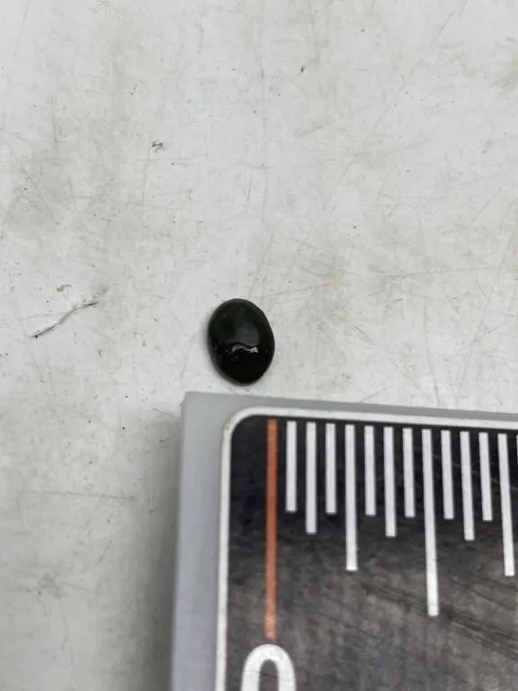 Green and black cabochon gemstones, pair