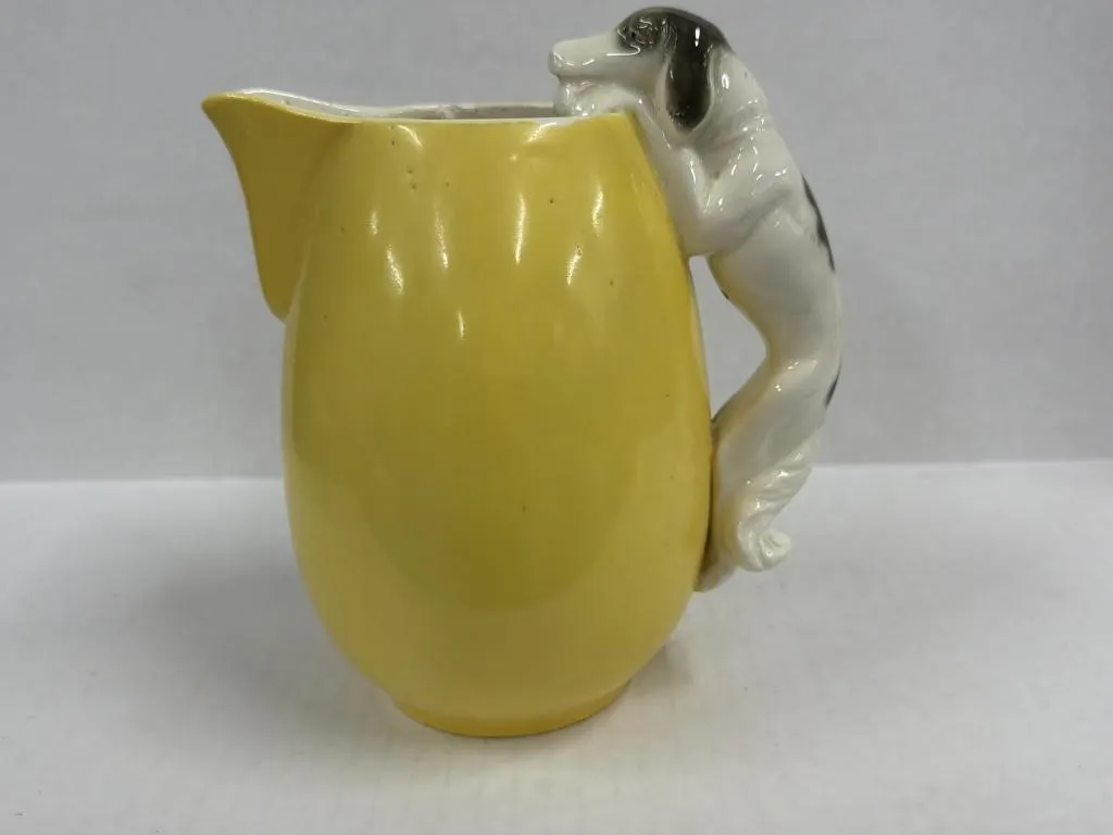 Ceramic Yellow Pitcher Featuring a Dog