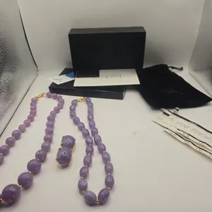 Vintage Joan Rivers, lavender Jade clip on earrings with matching lavender Jade Bead necklace.
