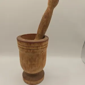 Vintage wooden apothecary pestle and mortar