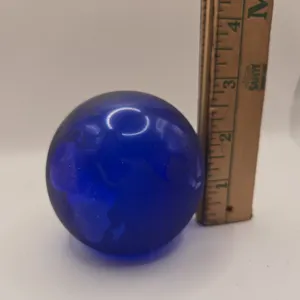 Vintage three inch glass paperweight.