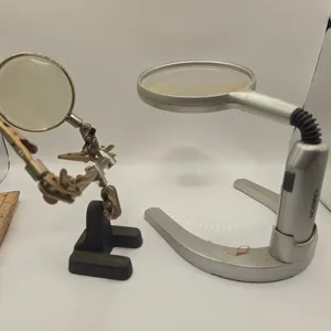 Helping hands magnifying tool