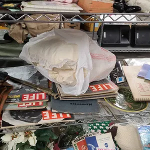 Lot from Second Shelf from Bottom: Life Magazines, Painted Plate, 1970, Memorabilia, and Printed Eph