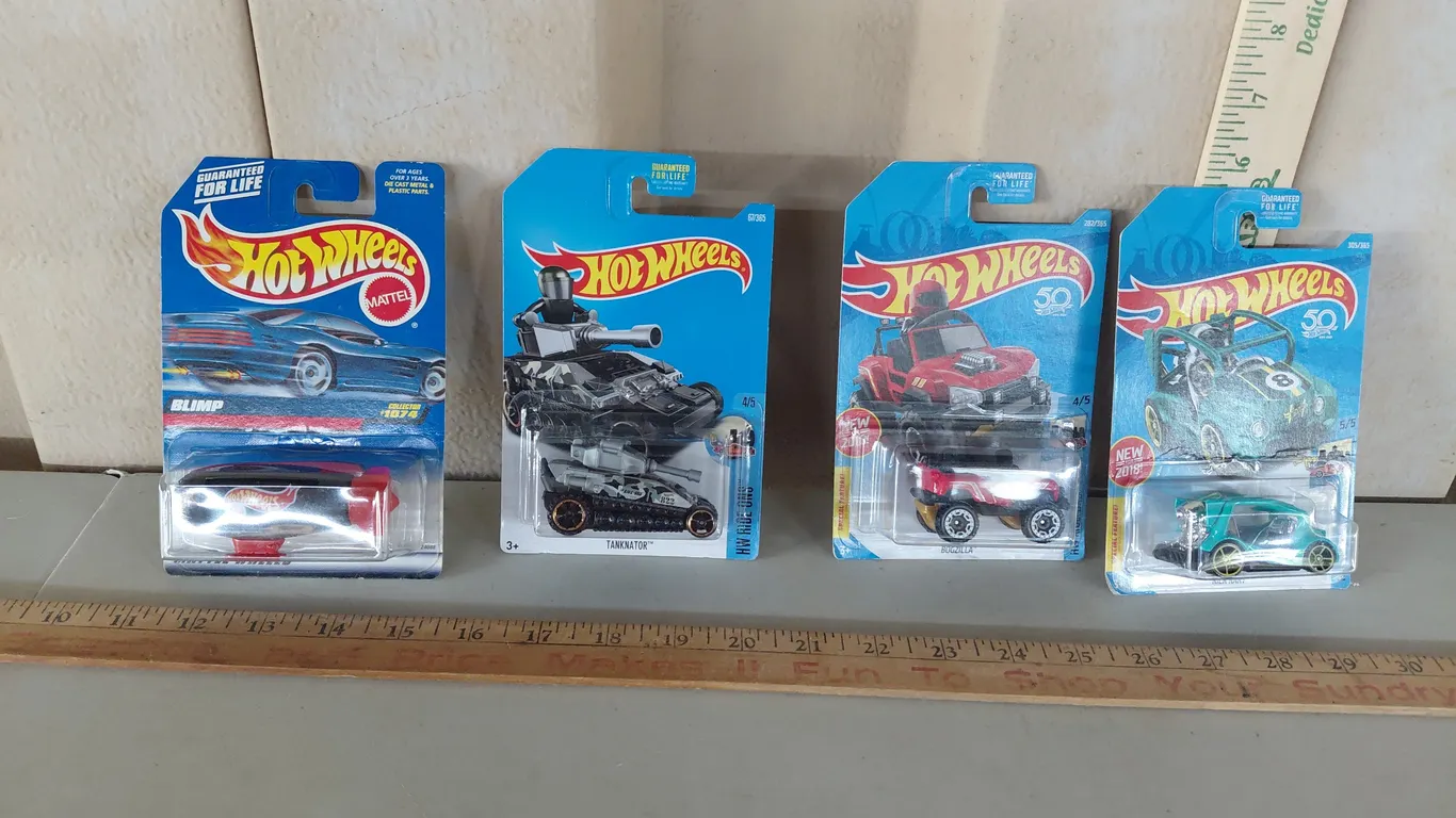 4 Assorted Hot Wheels