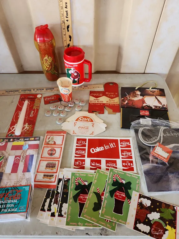 Coca Cola Items-Bottle, Cup, Candle, Gift Bags, Bottle Holder, Small Box, Stickers, Etc.