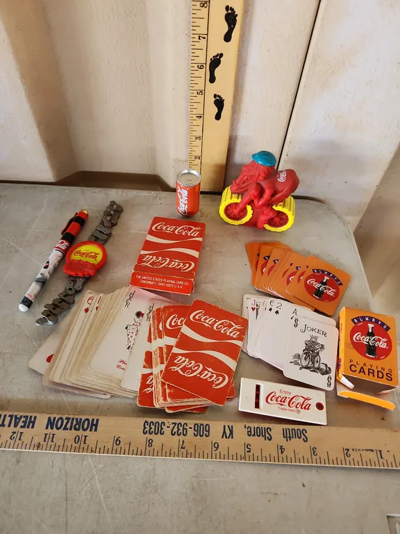 Vintage Coca Cola Items-Mini Can, Cycle On Bike, Playing Cards, Kids Watch Band, Pen, & Noise Maker