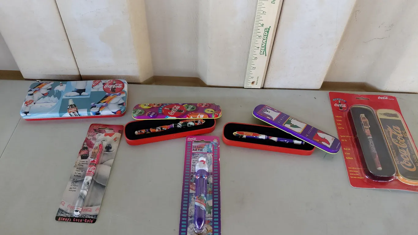 Assorted Coca Cola Collector Pens & Tins