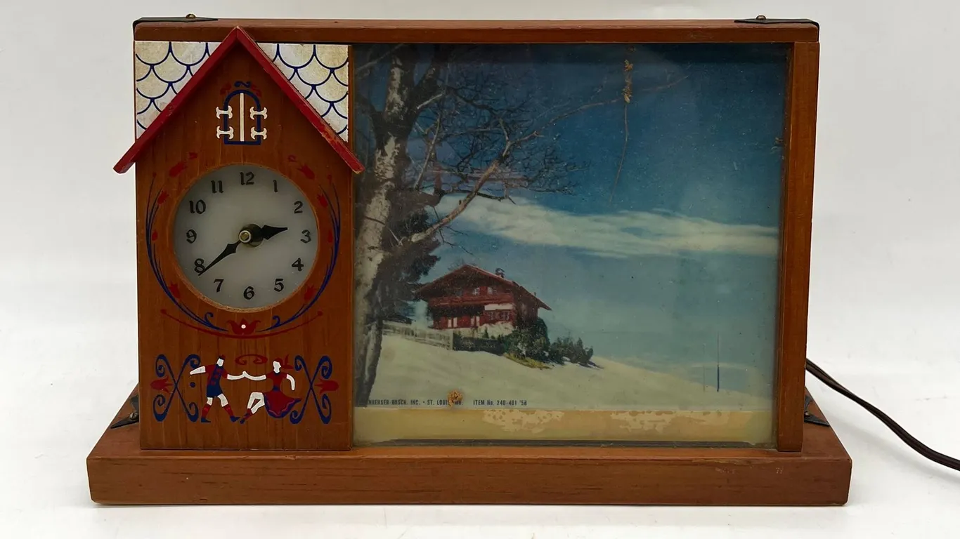 Raymond M. Price Chalet Beer Light Clock