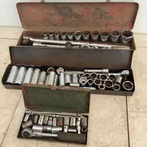 Quantity of 1/4", 3/8", and 1/2" drive SAE sockets