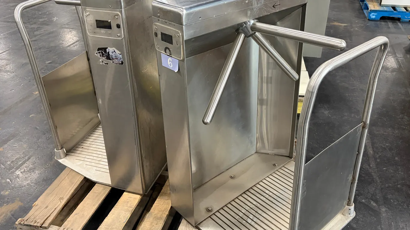 (2) STAINLESS STEEL TRIPOD TURNSTILES FROM REXALL PLACE