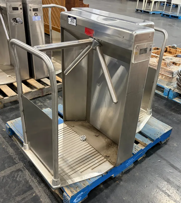 (2) STAINLESS STEEL TRIPOD TURNSTILES FROM REXALL PLACE