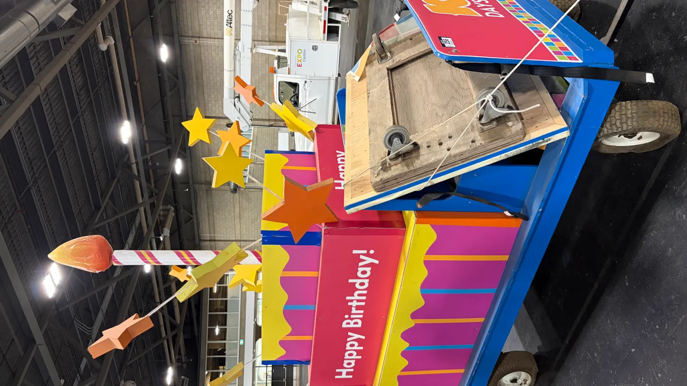 CUSTOM-BUILT K-DAYS BIRTHDAY CAKE PARADE FLOAT ON FOUR-WHEEL WAGON CHASSIS