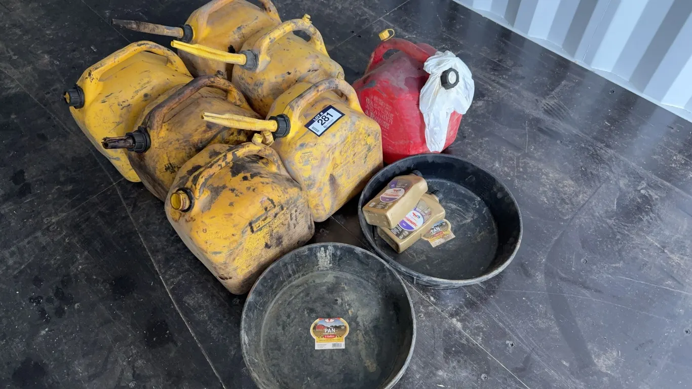 Lot of (7) Fuel Cans and (2) Oil Drip Pans
