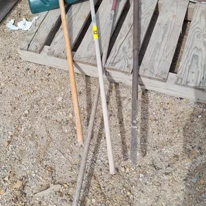 Rake, snow shovel and pry bar
