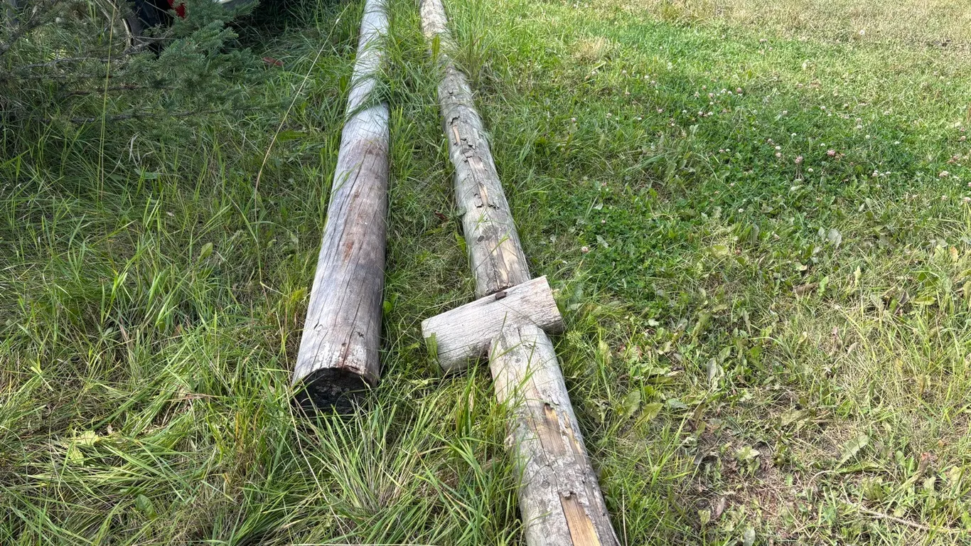 **OFF SITE** (2) Approx. 24' Long Power Poles.