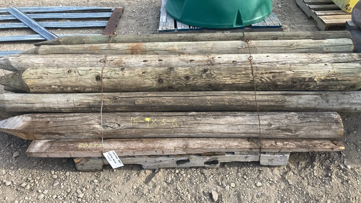 (15) 7' by 5"-6" Treated Fence Posts (Used)