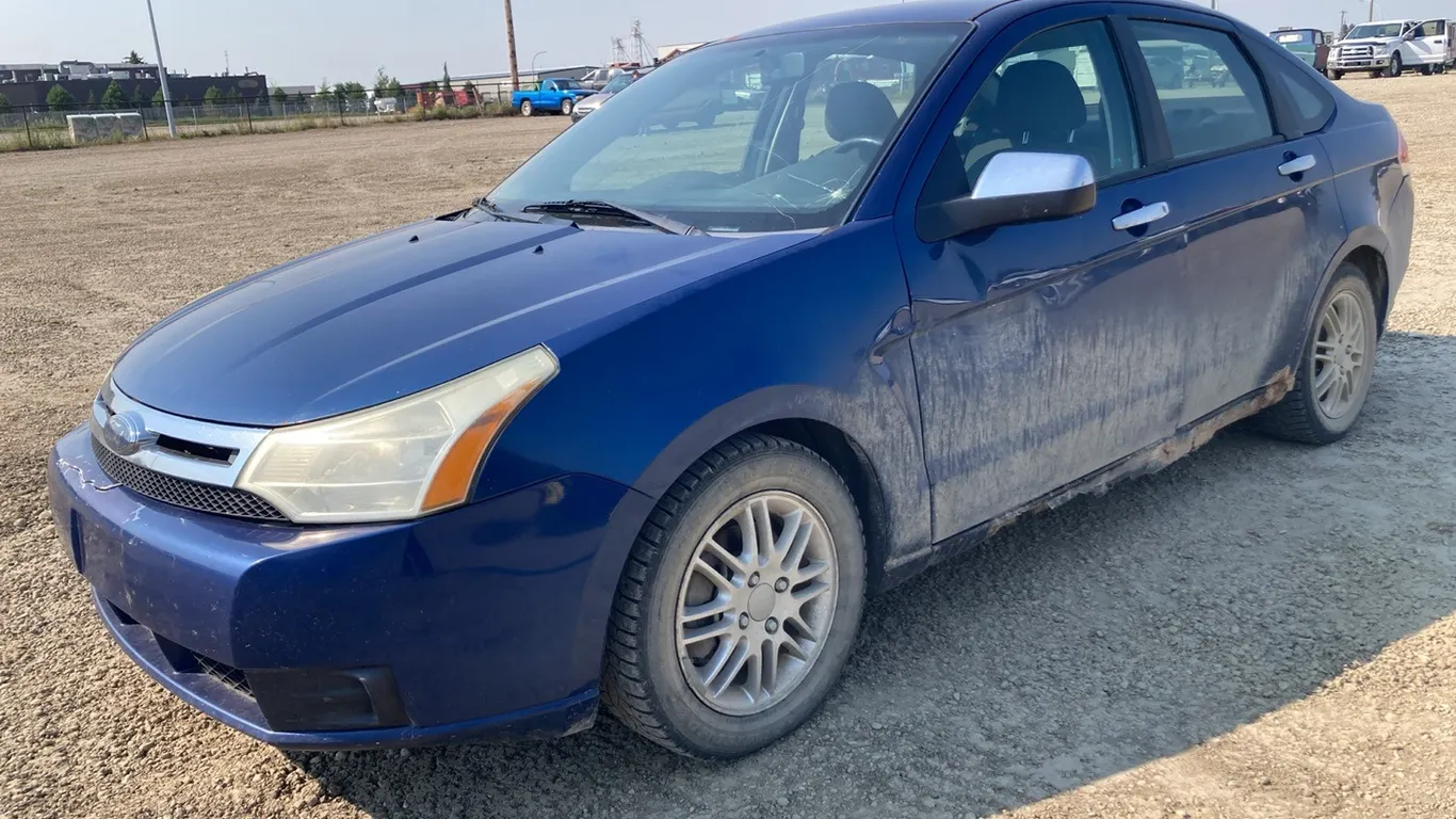 2009 Ford Focus Blue Car VIN: 1FAHP35N19W115419