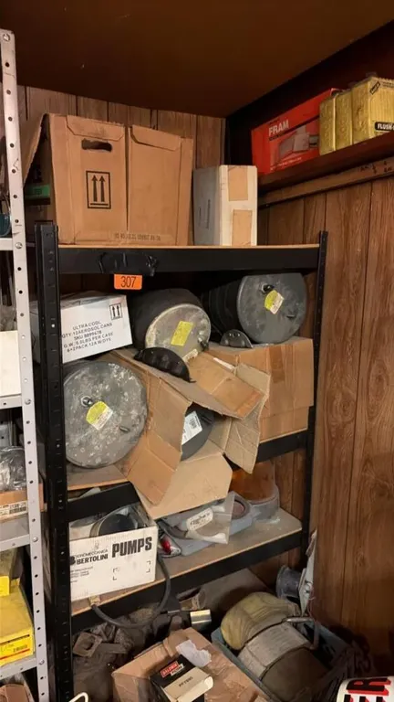 Shelf of truck parts, contents included