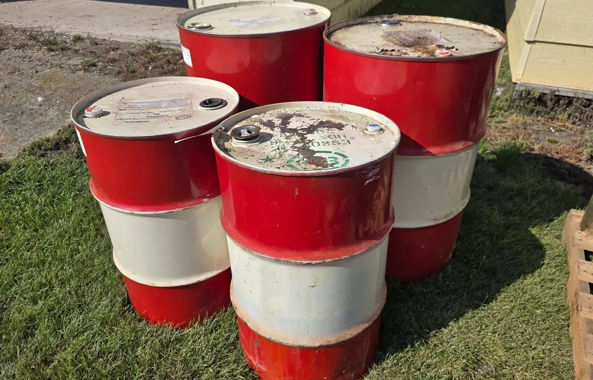 (4) Empty Esso Lubricant Barrels
UNRESERVED
