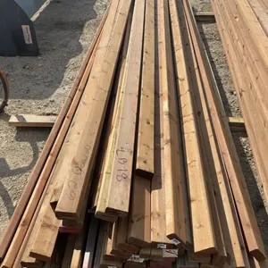 62 Brown Pressure Treated Lumber 2 × 4 × 14ft Boards