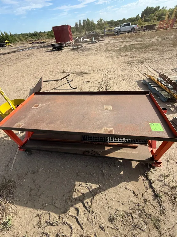 1 Heavy Duty Orange Cart on casters, 6’6” long