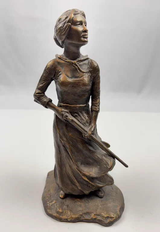 Vintage Lady with Gun Statue, 1990