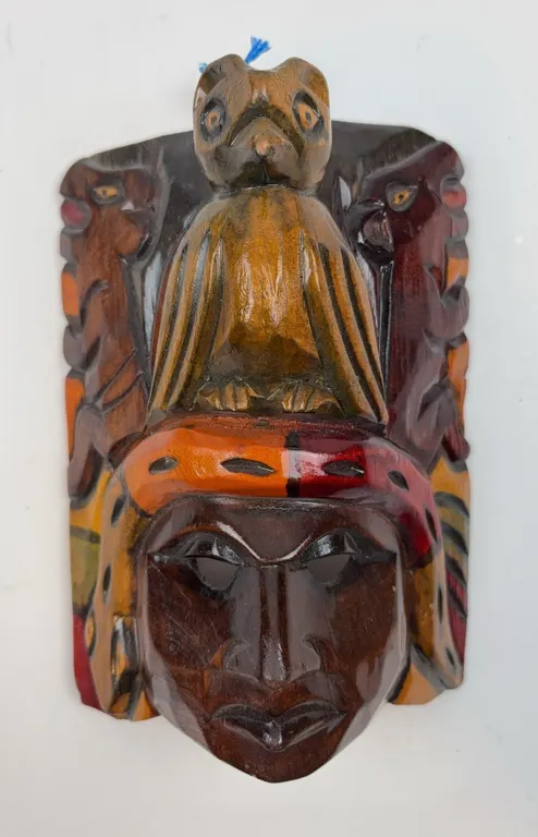 Hand-Carved Tribal Wall Mask with Eagle Figure