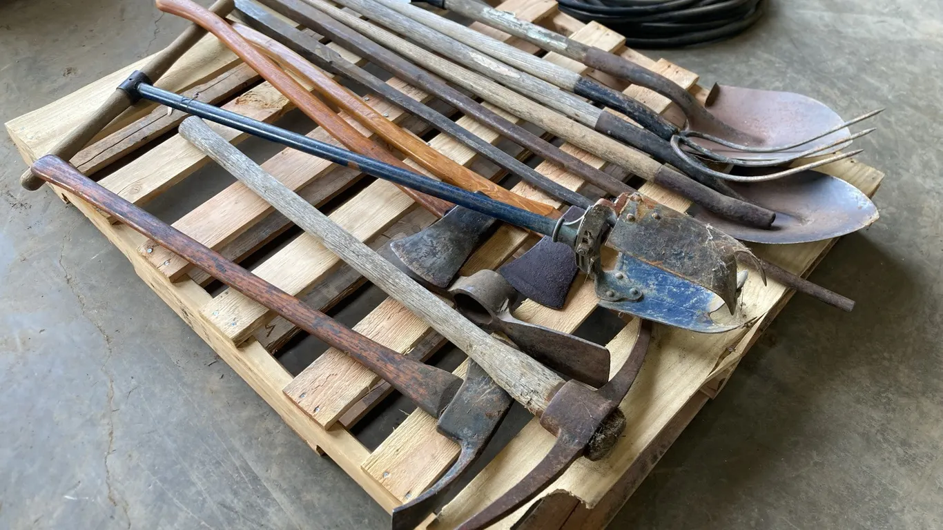 Pallet with Shovels, Pic Axes, Axes, Pry Bars