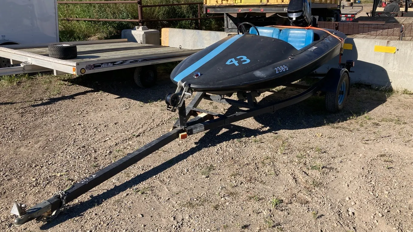 Ex-EL 10' Fibreglass V Hull Boat s/n: PLAZER1086 with Trailer s/n: P04098 and 50HP Mercury Outboard Motor s/n: 7128746